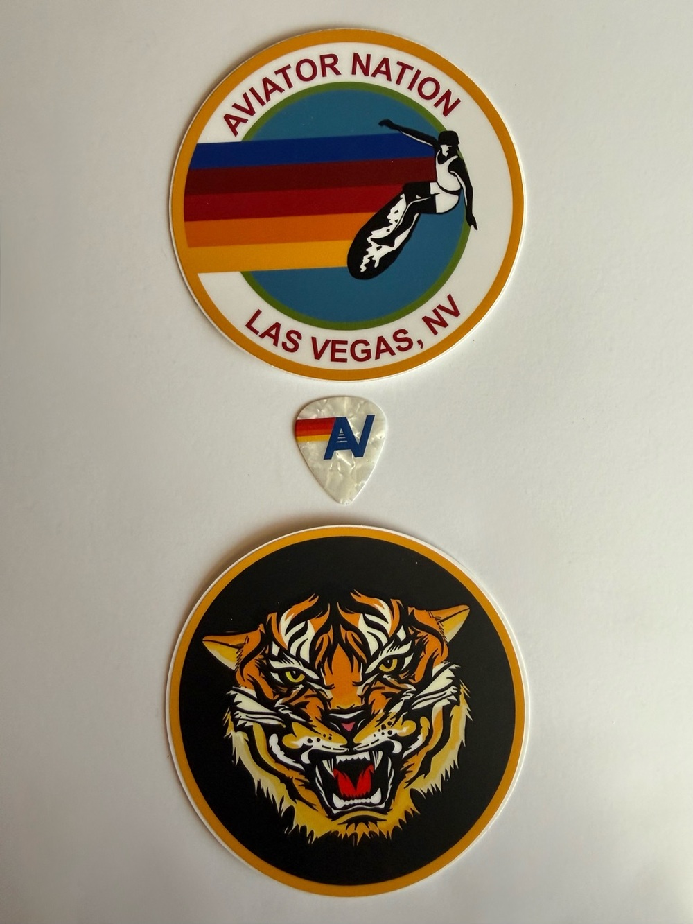 Aviator Nation Las Vegas Vinyl Stickers Surfer and Tiger plus Cool Guitar Pick